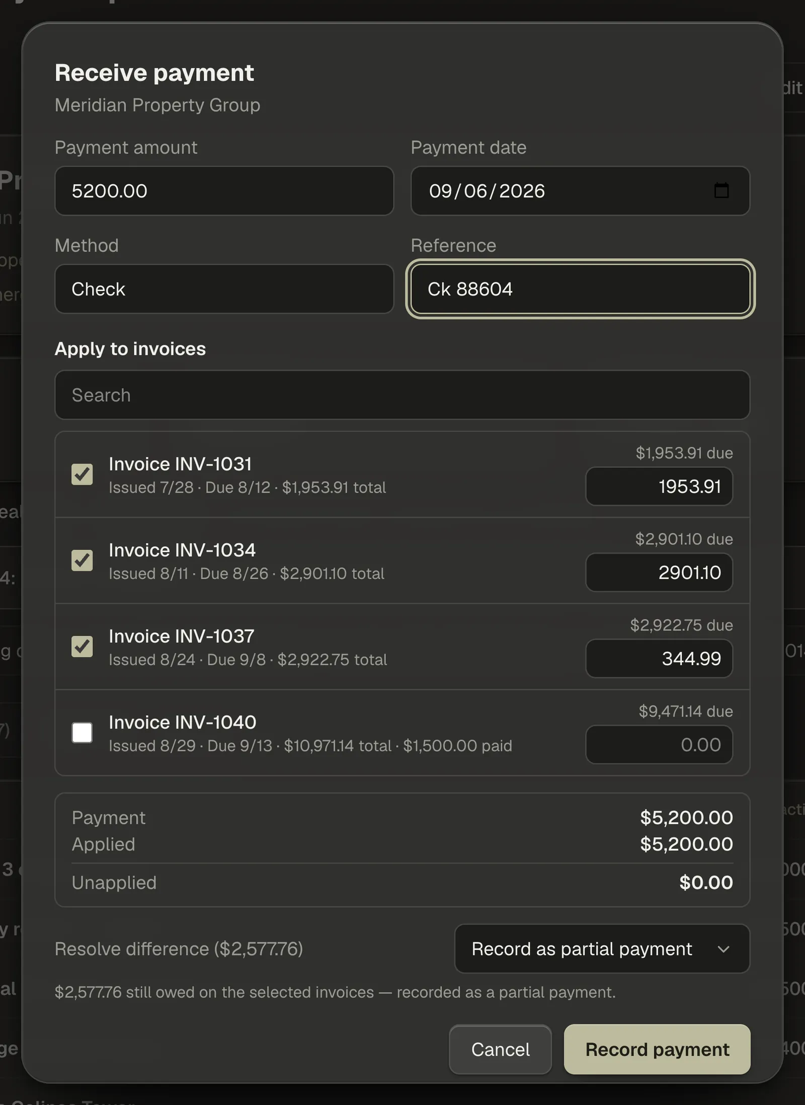The Receive payment window: amount, date, method and reference across the top, the client's open invoices with editable amounts below, and the Payment, Applied and Unapplied totals underneath.