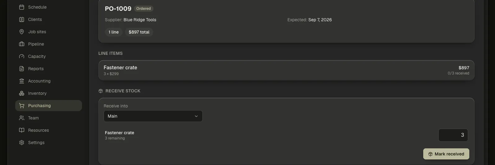A purchase order's detail page with the Receive stock block open: the Receive into picker, a quantity per line, and Mark received.